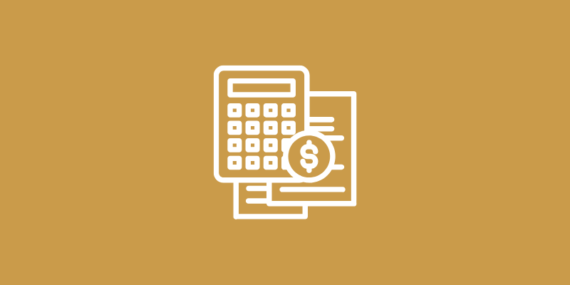 Calculator and financial documents on brown background.