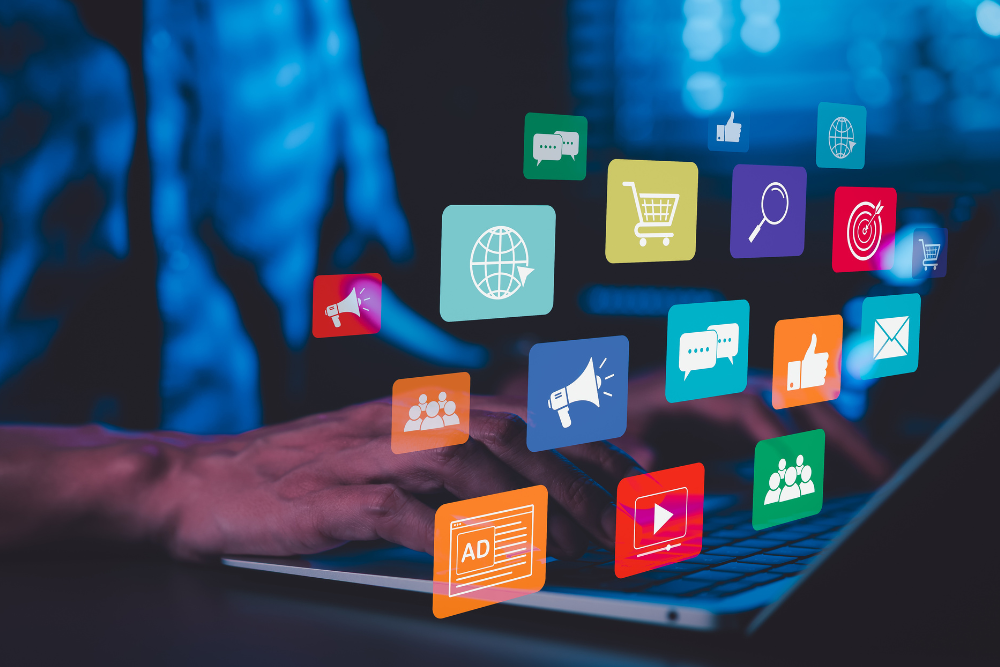 Colorful digital marketing icons floating over keyboard.