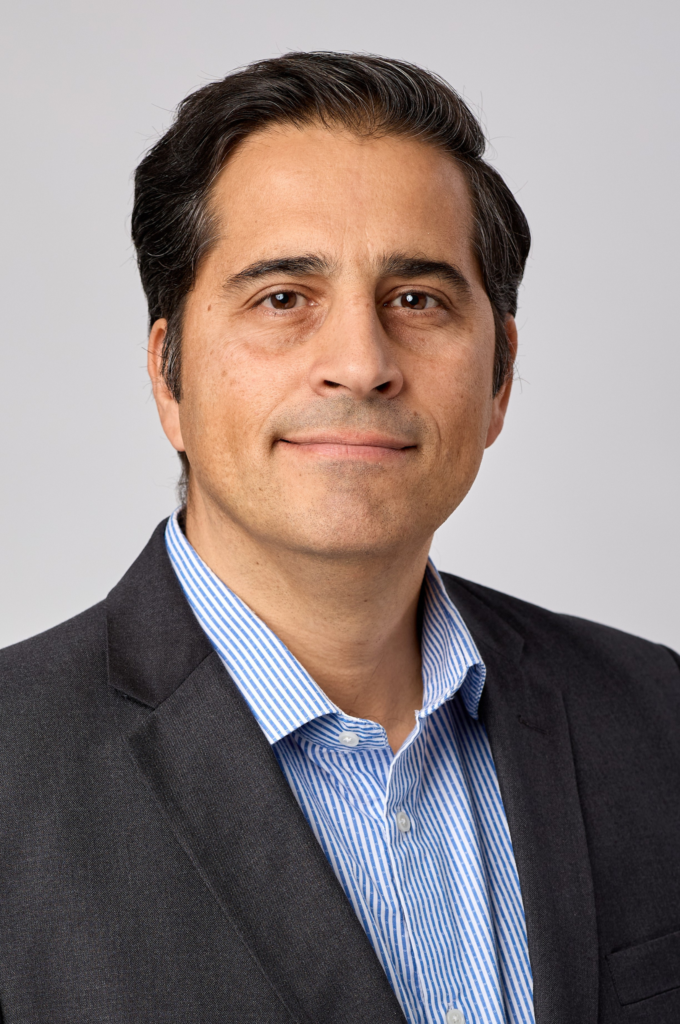 Man in business suit smiling